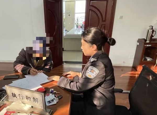 杜集区法院：借钱朋友成“冤家” 温情执行促履行